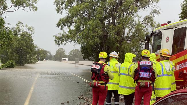 QFES crews are responding to a truck stranded in floodwaters at Pimpama. Picture: Charlton Hart