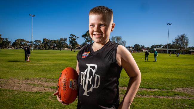 Marley playing one last football game in Ethelton before undergoing surgery to repair damage to his throat and oesophagus. Picture: Tom Huntley