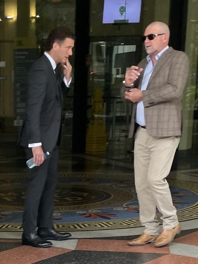 (L-R) Joch McLean and father Mike McLean, a former State of Origin rep player, outside Downing Local Court on December 1.