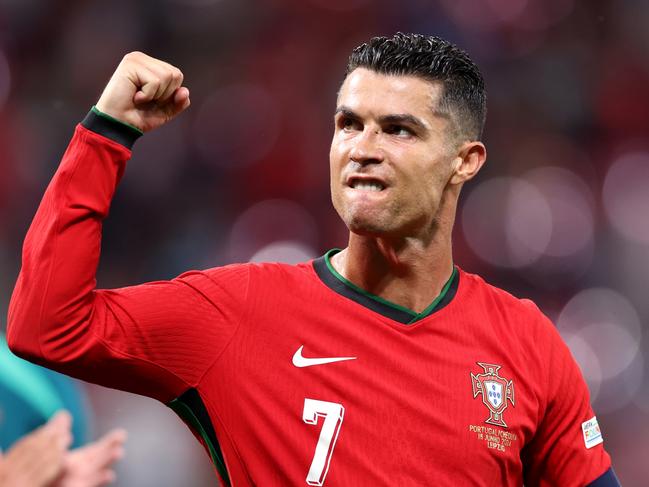 LEIPZIG, GERMANY - JUNE 18: Cristiano Ronaldo of Portugal acknowledges the fans as he celebrates victory after the UEFA EURO 2024 group stage match between Portugal and Czechia at Football Stadium Leipzig on June 18, 2024 in Leipzig, Germany. (Photo by Alex Livesey/Getty Images)