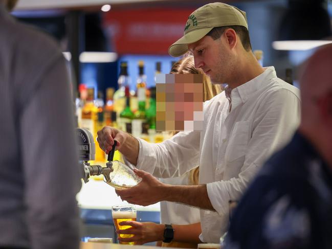 The former MP was seen pouring beers at Paddy’s Markets in March. Picture: Daily Telegraph / Dylan Coker