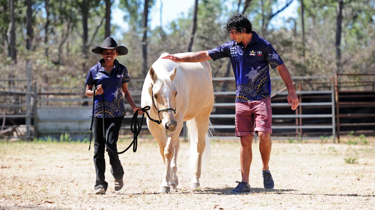 Cowboys player Johnathan Thurston at Toomby Horsemanship with Shaunica Leecheu, 17, of Chillagoe. Picture: Scott Radford-Chisholm, August 2013