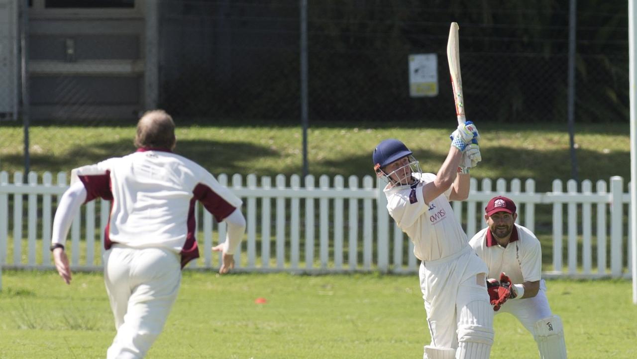 Lachlan Prince hits a six.