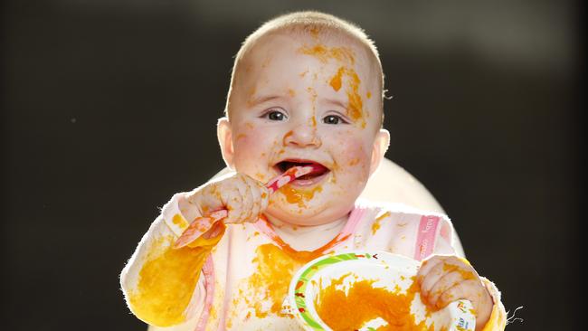 Babies should be given solid food from four months of age according to the new guidelines. Picture: David Caird.