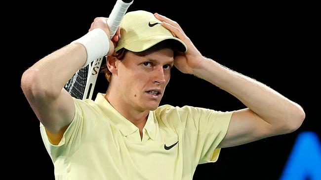 Italy's Jannik Sinner celebrates the match point against Germany's Alexander Zverev during their men's singles final match on day fifteen of the Australian Open tennis tournament in Melbourne on January 26, 2025. (Photo by Martin KEEP / AFP) / -- IMAGE RESTRICTED TO EDITORIAL USE - STRICTLY NO COMMERCIAL USE --