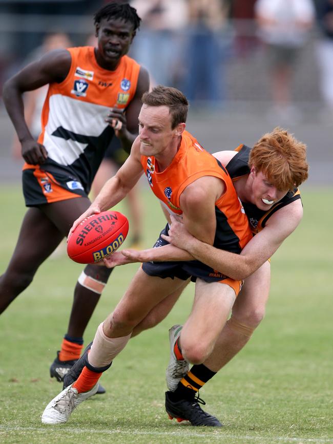 GFL: Geelong West Giants v Grovedale. Geelong West's Jayden Symes tackled by Grovedale's Jacob Gneil. Picture: Mike Dugdale