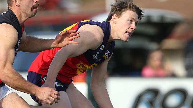 Joshua Wallace of Diggers Rest (right) contests with Jake Safstrom of Riddell during RDFL footy: Diggers Rest v Riddell on Saturday, July 6, 2019, in Diggers Rest, Victoria, Australia. Picture: Hamish Blair