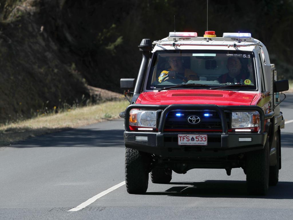 Tasmania Fire Service vehicle heads along Glenlusk Road. Bushfire on Collinsvale Road Glenlusk. Picture: NIKKI DAVIS-JONES