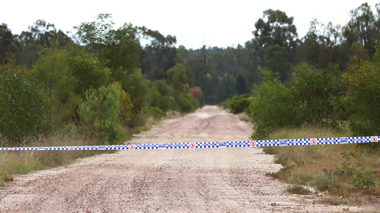 The road leading into Wains Road at Wieambilla was on Tuesday closed off and being guarded by police. Picture David Clark NCA/NewsWire