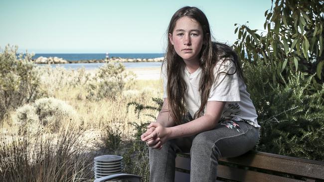 Frida Meares, 12, of Canberra, was the first person to alert surf lifesavers to the girls in trouble at Glenelg. Picture: AAP / Mike Burton