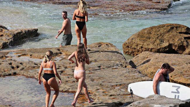 Swimmers at Tamarama Beach this morning. Picture: Adam Yip