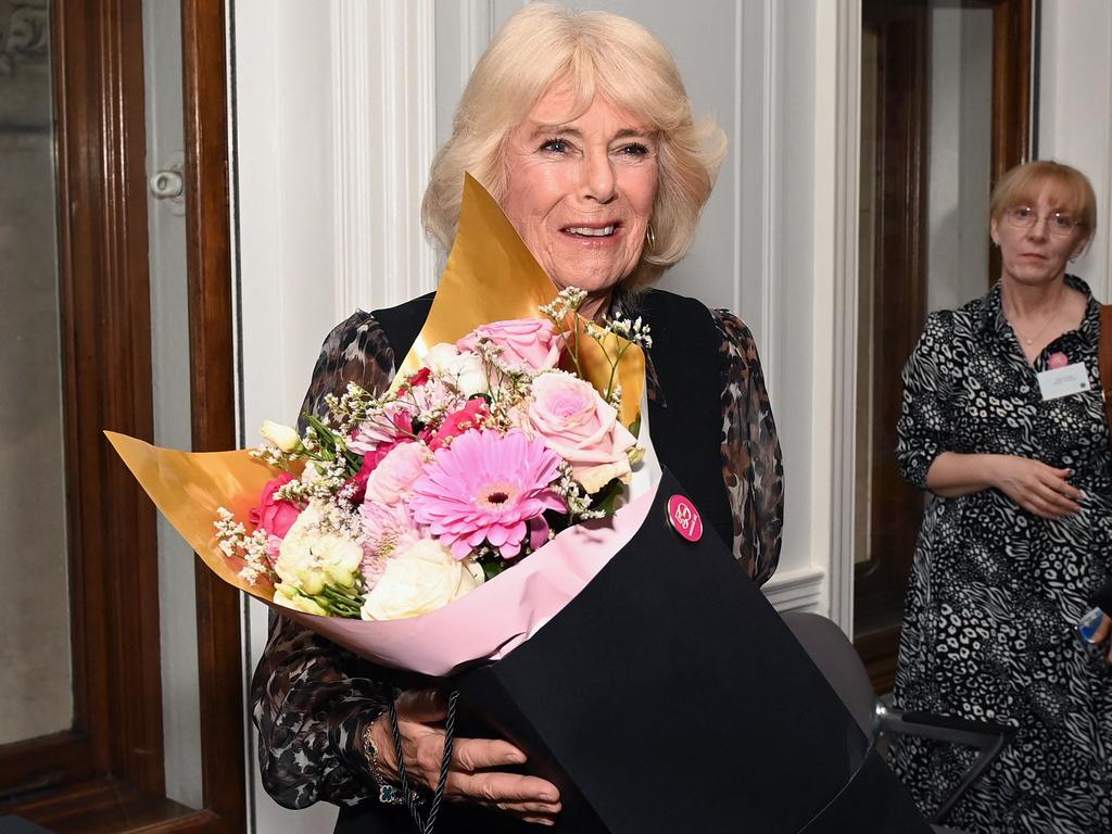 Queen Camilla smiled as she stepped out in support of the organisation Women's Aid in London. Picture: AFP