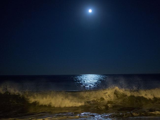 Surf breaks as the moon makes its closest orbit to the Earth since 1948 on November 14, 2016 in Redondo Beach, California. Picture: David McNew/Getty Images/AFP