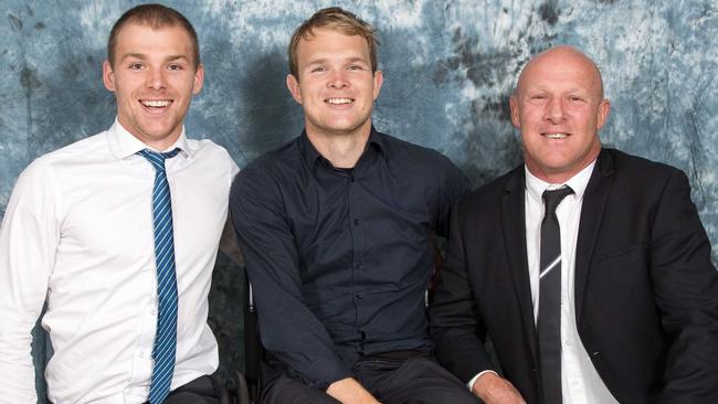 Kicking goals: New Leongatha Football Club coach Beau Vernon (centre) with dad, Daryl (right) and brother Zak (left) at the Parrots' 2014 presentation night on Friday, September 12, 2014. Zak won Leongatha's senior best-and-fairest award on the night. Picture: Mark Drury