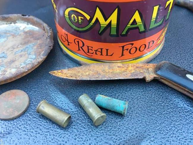 Shell casings, a pocket knife and a Malt tin were found in the rear of the FJ ute decades after the fatal shooting. Picture: Jeff Darmanin