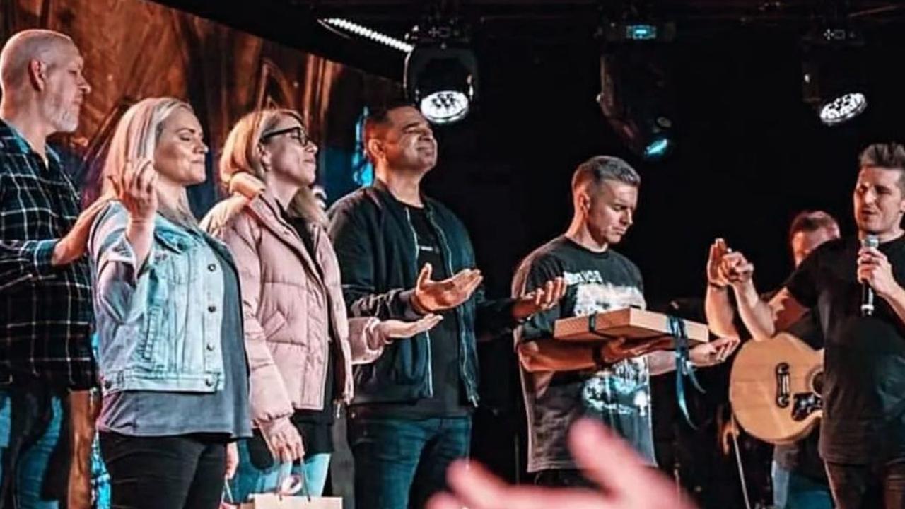 Corey Turner, third from the right, seen on stage with Stacey Hillar, second from the left, during an October 2023 trip to Europe. Picture: Instagram