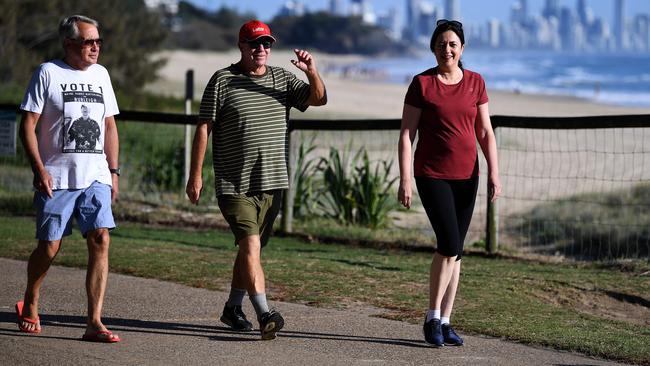 Labor’s candidate for Burleigh Wayne "Rabbit" Bartholomew (centre) and former federal Treasurer Wayne Swan during a morning walk at Burleigh Heads with Premier Annastacia Palaszczuk. Picture: NCA NewsWire/Dan Peled