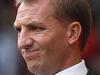 Liverpool's Northern Irish manager Brendan Rodgers gestures during the English Premier League football match between Liverpool and West Ham at the Anfield stadium in Liverpool, north-west England on August 29, 2015. AFP PHOTO / LINDSEY PARNABY RESTRICTED TO EDITORIAL USE. No use with unauthorized audio, video, data, fixture lists, club/league logos or 'live' services. Online in-match use limited to 75 images, no video emulation. No use in betting, games or single club/league/player publications.