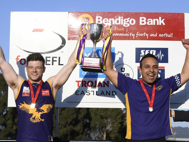 Lachlan Johns and Harmit Singh celebrates last year’s flag. Picture:Andy Brownbill