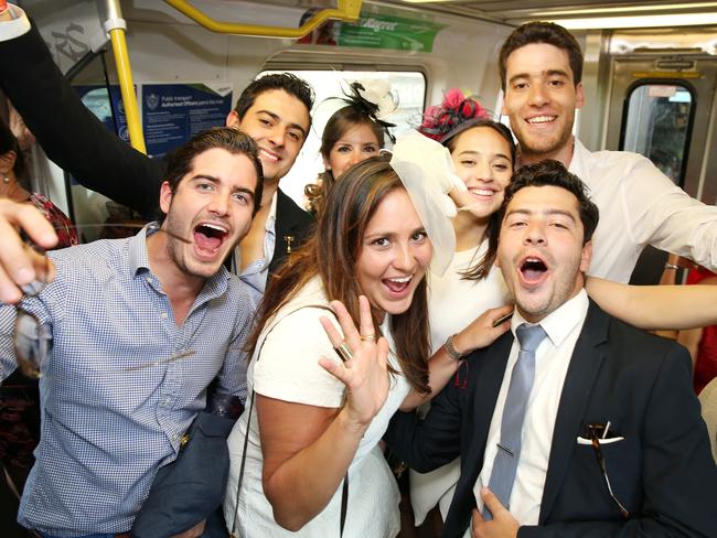 Racegoers return to the city after Melbourne Cup Day 2014 at Flemington Racecourse. Picture: Nathan Dyer