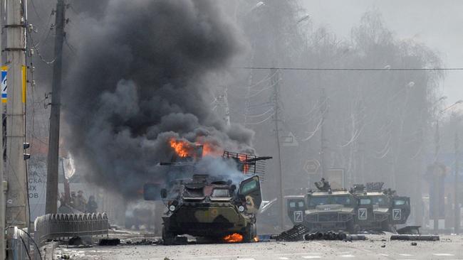 A Russian armoured personnel carrier (APC) burns in Kharkiv. Picture: AFP