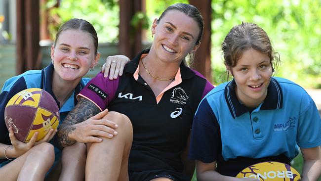 Broncos inaugural NRLW player Julia Robinson, who has re-signed to become a club member for life, with fans Sophie Hendy, 17, and Caitlin Peall, 15, at Aspley Special School, in Aspley, Brisbane. Picture: Lyndon Mechielsen/Courier Mail