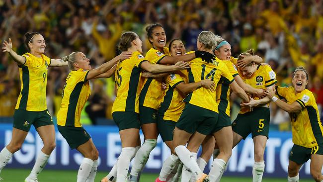 Matildas players celebrate winning the FIFA Womens World Cup against France at Brisbane Stadium. Picture: Lachie Millard