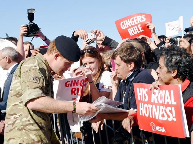 After a secondment with the Australian Army, Prince Harry speaks with keen members of the public during a visit to the Sydney Opera House in 2015. Picture: Dean Lewins/AAP