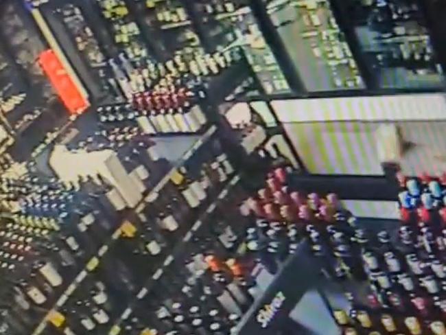 CCTV footage of a break in at the Fannie Bay IGA shows damaged being caused to their fridges. Picture: Facebook.