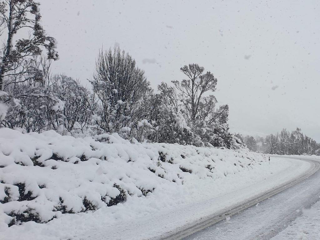 Heavy snow on the road past Maydena, in the Mt Field National Park