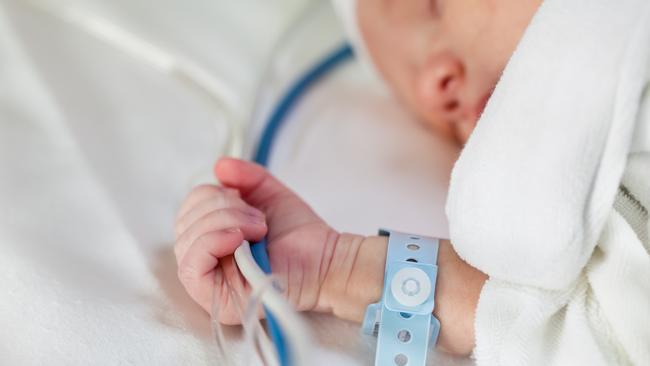 The 11-month-old girl was allegedly placed in a chokehold.