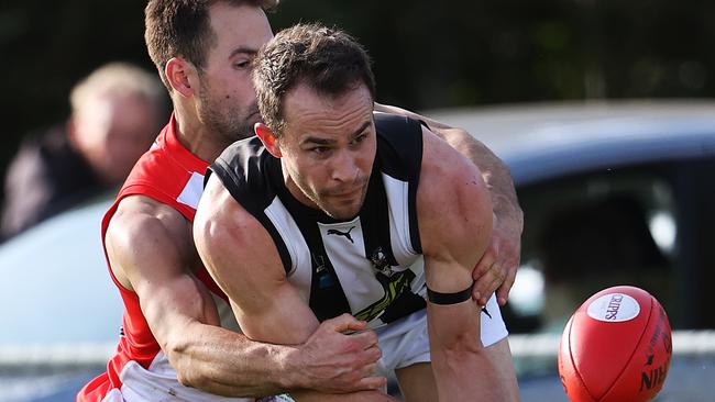 Action from TSL game between Clarence v Glenorchy from Richmond Oval. Clarence's Clint Riley tackles Glenorchy's Jaye Bowden. Picture: ZAK SIMMONDS