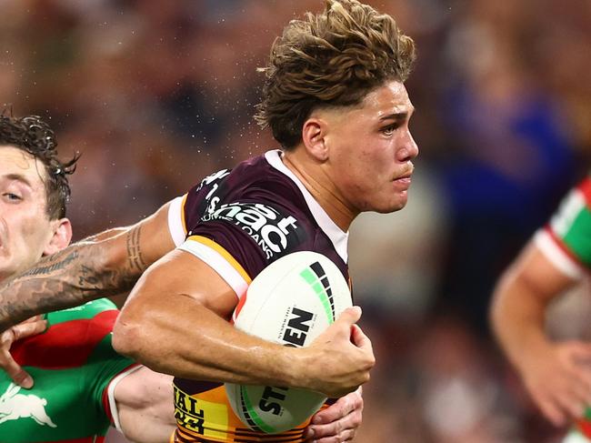 BRISBANE, AUSTRALIA - MARCH 14: Reece Walsh of the Broncos makes a break to score a try during the round two NRL match between Brisbane Broncos and South Sydney Rabbitohs at Suncorp Stadium, on March 14, 2024, in Brisbane, Australia. (Photo by Chris Hyde/Getty Images)