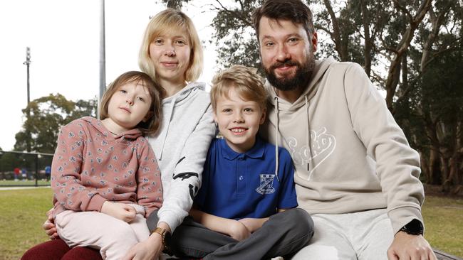 Ukrainian refugee siblings Elijah and his sister Amelia would run for shelter in the streets when planes would fly overhead. Picture: Jonathan Ng