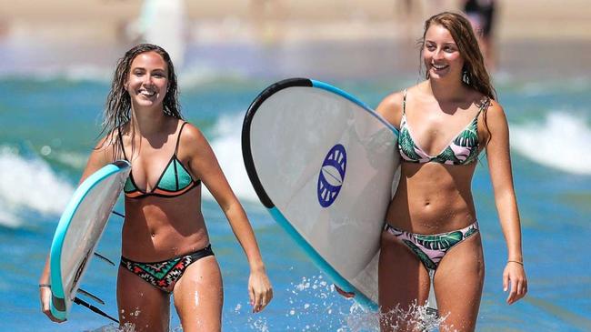 LOVE THE SURFING LIFE: Kayla Hill (left), 19, and Tahlia Dales, 20, from Perth. Picture: Nigel Hallett