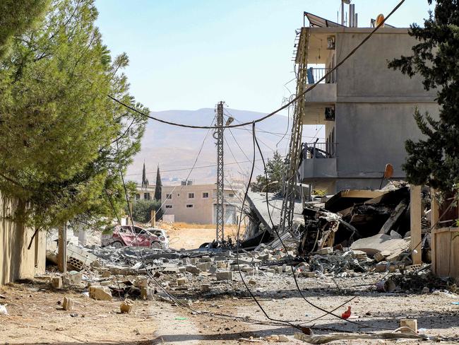 A collapsed building destroyed by an Israeli air strike is pictured in Lebanon's eastern city of Baalbek in the Bekaa Valley on October 8, 2024. (Photo by Nidal SOLH / AFP)