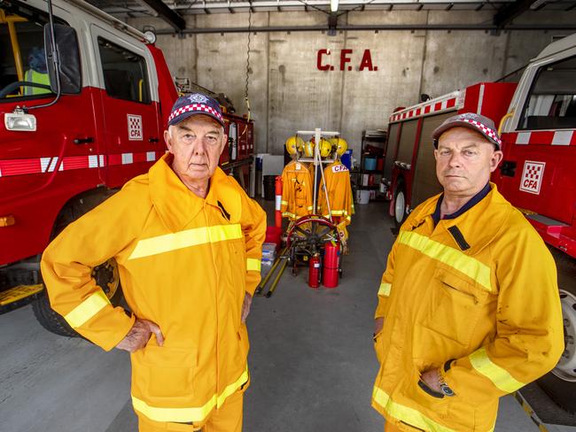 23/10/2020: Retired CFA captain Frank Whelan  and former CFA captain Warren Davis at Lilydale fire station where they have both been reinstated as volunteers after being wrongly stood down and have since cleared their names of wrong doing. Picture: David Geraghty