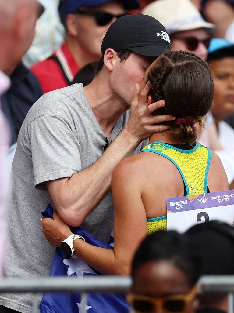 Australian Jemima Montag is congratulated by her partner after winning gold. Picture by Michael Klein