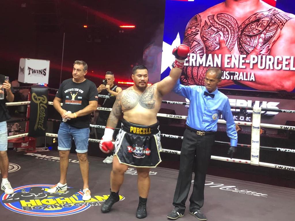 Toowoomba's Herman Ene Purcell (right) celebrates his knockout win against Tanapat Vibulsuk. Picture: Contributed