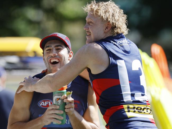 NCA. MELBOURNE, AUSTRALIA. 22th November 2024.  AFL . Melbourne training at Gotchs Paddock.  Christian Petracca has a laugh with Clayton Oliver  during todays training session .  Picture: Michael Klein