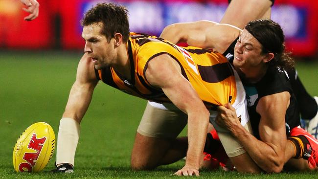 Hawthorn, led by skipper Luke Hodge, sits atop the AFL ladder - just. Picture: Getty Images