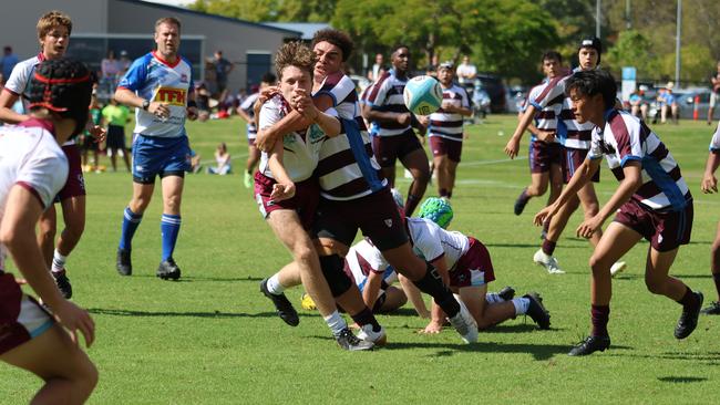 Jamie Critchley making a tackle. Pic credit: Barbara Herrmannsen