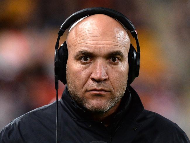 BRISBANE, AUSTRALIA - AUGUST 08: Former Broncos players Gordon Tallis is seen working as a commentator for radio station Triple M before the round 22 NRL match between the Brisbane Broncos and the Canterbury Bulldogs at Suncorp Stadium on August 8, 2014 in Brisbane, Australia. (Photo by Bradley Kanaris/Getty Images)