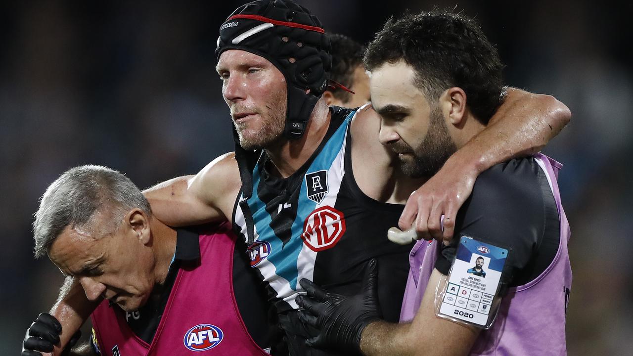 Brad Ebert is taken from the ground after suffering a concussion during the first preliminary final at Adelaide Oval in 2020. Picture: Getty Images