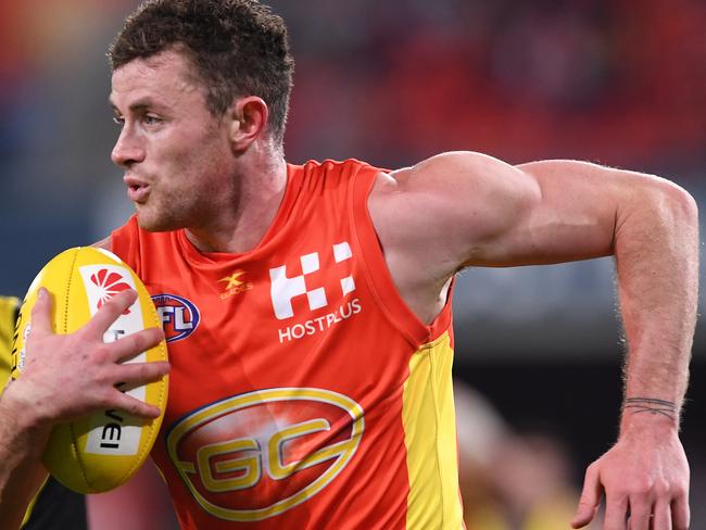 Suns player Pearce Hanley during the round 19 AFL match between the Gold Coast Suns and the Richmond Tigers at Metricon Stadium on the Gold Coast, Saturday, July 29, 2017.  (AAP Image/Dave Hunt) NO ARCHIVING, EDITORIAL USE ONLY