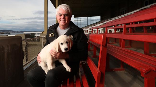 Scott Gadd Royal Agricultural Society of Tasmania president with puppy Wilby at the Hobart Regatta Grounds. The Royal Hobart Show will move to the Hobart Regatta Grounds while the Glenorchy site is redeveloped over several years. Picture: Nikki Davis-Jones