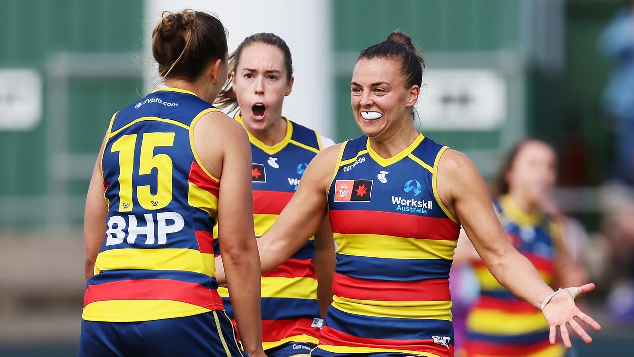 ADELAIDE, AUSTRALIA - OCTOBER 29: Danielle Ponter and Ebony Marinoff of the Crows celebrate a goal during the 2023 AFLW Round 09 match between The Adelaide Crows and The North Melbourne Tasmanian Kangaroos at Norwood Oval on October 29, 2023 in Adelaide, Australia. (Photo by James Elsby/AFL Photos via Getty Images)