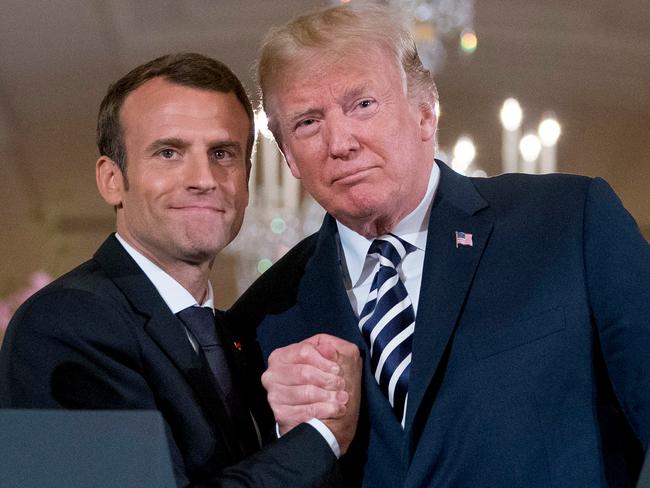 French President Emmanuel Macron and President Donald Trump embrace at the White House in Washington last week. Picture: Andrew Harnik