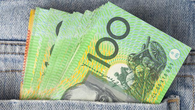 Australian 100 dollar notes in jeans pocket. money, wealthy, rich generic