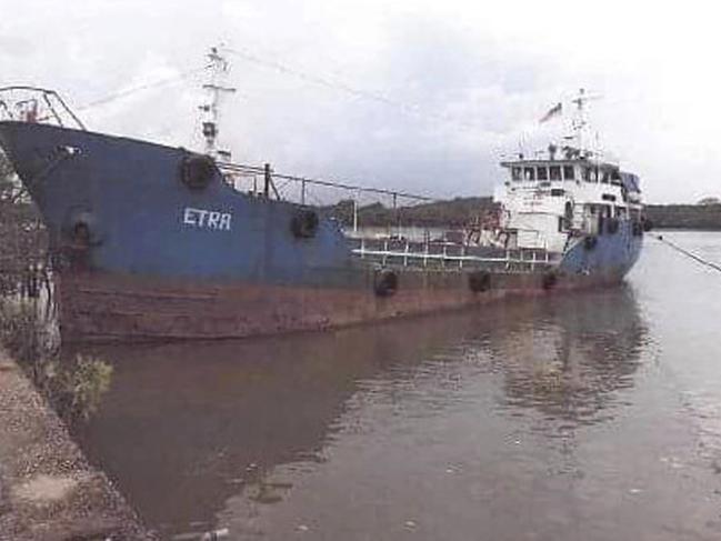 This May 5, 2018, photo,  released by the Royal Malaysian Police shows a rusty tanker near Kota Tinggi in Johor state, Malaysia. Malaysian police have intercepted the tanker with 131 Sri Lankans believed bound for Australia and New Zealand, smashing a large human smuggling ring that has been operating for over a year. (Royal Malaysia Police via AP)